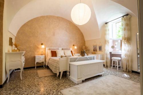 Ένα ή περισσότερα κρεβάτια σε δωμάτιο στο A casa di Angiulì - Casa Vacanze