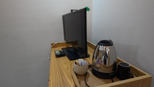 Příslušenství pro přípravu čaje a kávy v ubytování Hostalio Pyramid View