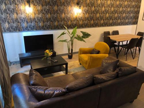 Zona de estar de chez joseph,appartements renovés et au calme à saint-michel