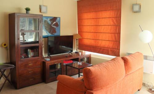 TV a/nebo společenská místnost v ubytování Vistas al mar