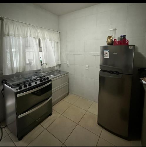 Kuchyň nebo kuchyňský kout v ubytování Casa sorriso-MT