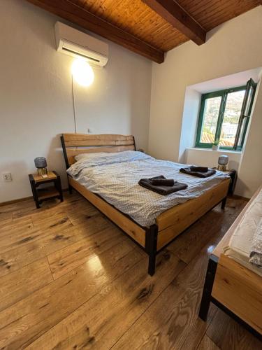 Postel nebo postele na pokoji v ubytování Villa Šoti