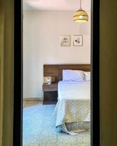 Postel nebo postele na pokoji v ubytování Hotel Herrera