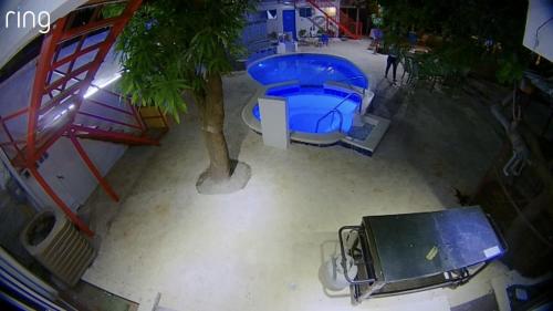 an overhead view of a swimming pool with a tree at VILLAS SONJASAA LOFt in Baní