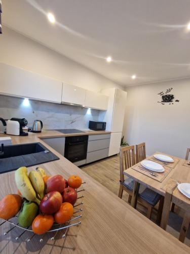 Kuchyň nebo kuchyňský kout v ubytování Apartament w Czarnowąsach 2