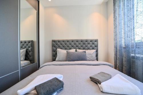 Ένα ή περισσότερα κρεβάτια σε δωμάτιο στο Apartman Obradovic Zlatibor Kalman