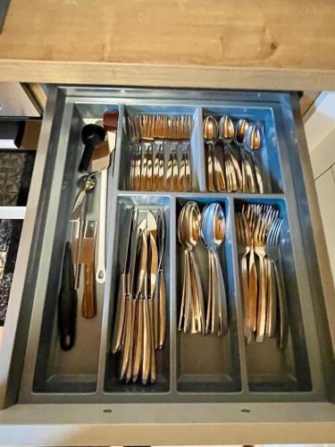 a drawer full of utensils in a kitchen at Traumhaus an der Lahn- Dreamhouse at River Lahn in Lahnstein