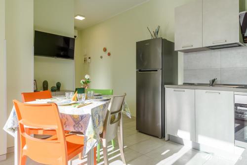 Η κουζίνα ή μικρή κουζίνα στο Condominio Gavioli - InVacanza