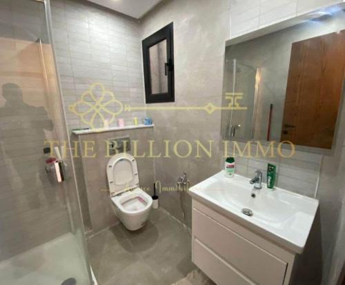 Ένα μπάνιο στο El Aouina al wahate