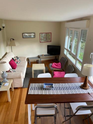 TV a/nebo společenská místnost v ubytování Casa acogedora con vistas al mar