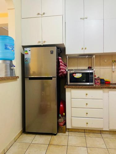 Кухня или мини-кухня в Your home in Cochabamba
