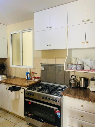 Кухня или мини-кухня в Your home in Cochabamba
