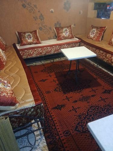 Posezení v ubytování Appartement Aboumalik