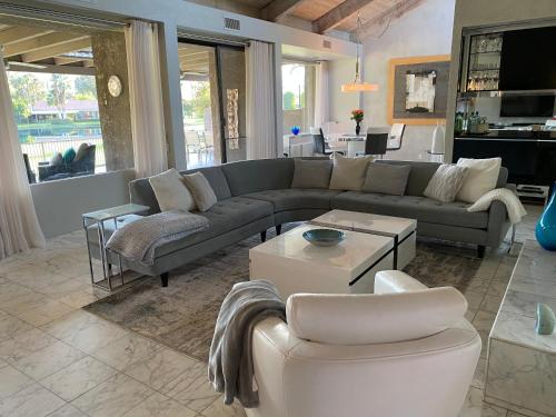 a living room with a couch and a table at Cloud Nine in Rancho Mirage