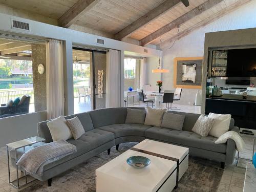 a living room with a couch and a table at Cloud Nine in Rancho Mirage