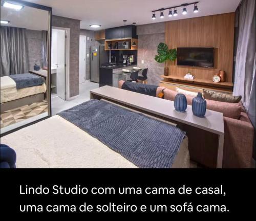 a living room with a couch and a table at Edifício Time - Ponta Verde - Apto 517 in Maceió