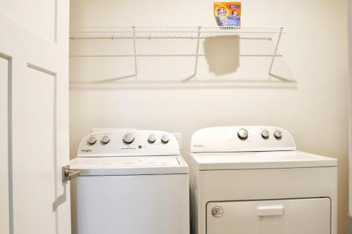 a kitchen with two ovens and a refrigerator at Mountain Whispers Harrisonburg JMU Shenandoah National Park in Harrisonburg
