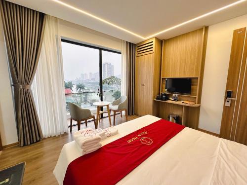 Postel nebo postele na pokoji v ubytování SOCA Hotel LAO CAI