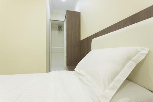 Ένα ή περισσότερα κρεβάτια σε δωμάτιο στο Hin Loi Homes