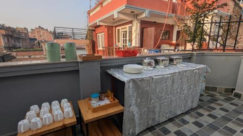 Un balcón o terraza en Nyadha House Bed & Breakfast