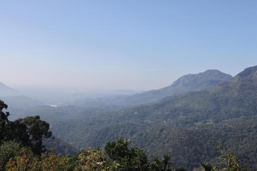 a view of a valley in the mountains at Awesome Place in Ella