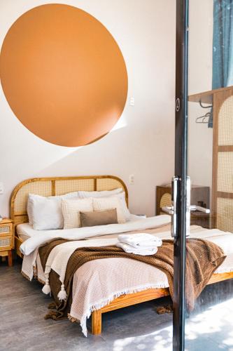 a bedroom with a bed with a large orb above it at Be Youth Villa Đà Lạt - O'TEL in Da Lat