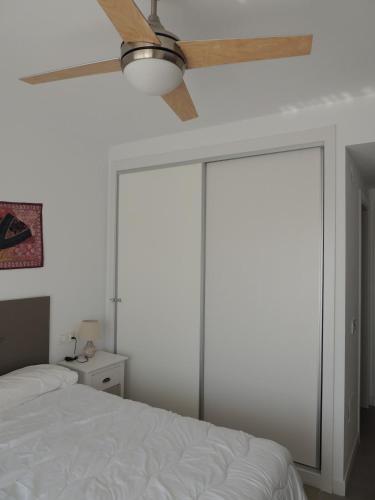 Ένα ή περισσότερα κρεβάτια σε δωμάτιο στο Apartamento confortable