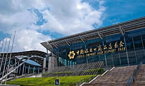 a building with a sign on the side of it at Lan Wan Hotel - Next to Huangsha Metro St ation -One cup of Free Cockt ail or Harbin Beer Per Room--Cha rgeable Airport Pick-up Service in Guangzhou