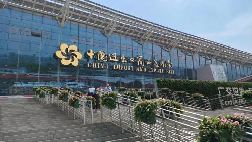 a building with a sign that reads guest import and export bar at Lan Wan Hotel - Next to Huangsha Metro St ation -One cup of Free Cockt ail or Harbin Beer Per Room--Cha rgeable Airport Pick-up Service in Guangzhou