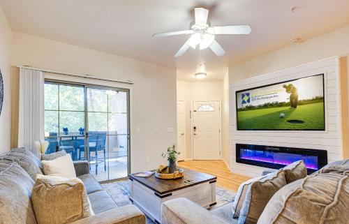 a living room with a couch and a flat screen tv at Southern #2067 Mesa in Mesa