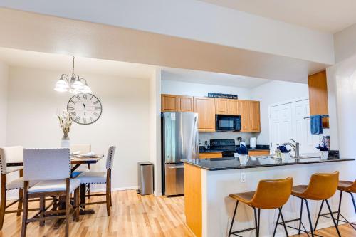 a kitchen and dining room with a table and chairs at Southern #2067 Mesa in Mesa