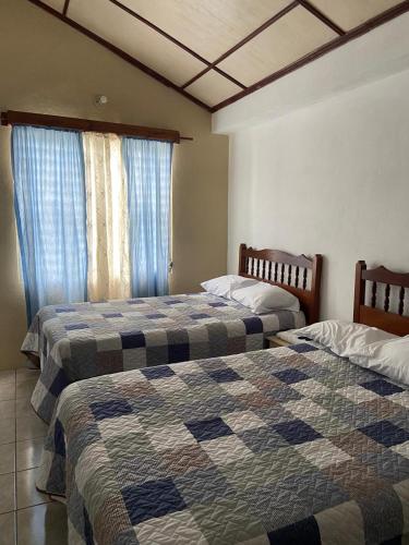 Ένα ή περισσότερα κρεβάτια σε δωμάτιο στο Katún boutique hotel