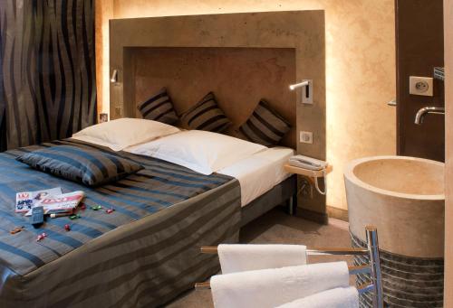 Hotel Saint-Martinにあるベッド