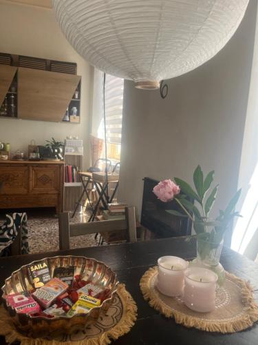 a table with a bowl of food on a table at Come a casa in Castelletto sopra Ticino