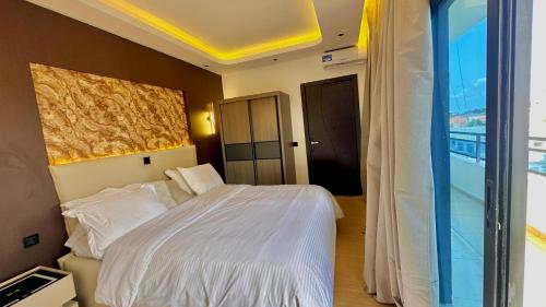 Ένα ή περισσότερα κρεβάτια σε δωμάτιο στο K-suites 302 - Appartement 1 chambre vue sur mer