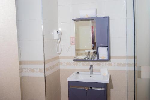 Salle de bains dans l'établissement Wils Hotel Supreme