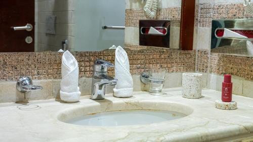 Koupelna v ubytování فندق الصفوة البرج الثالث Al Safwah Hotel Third Tower 3