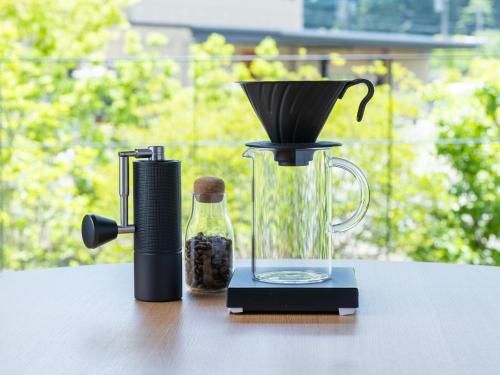 a blender sitting on top of a table at 7c villa and winery in Fujikawaguchiko