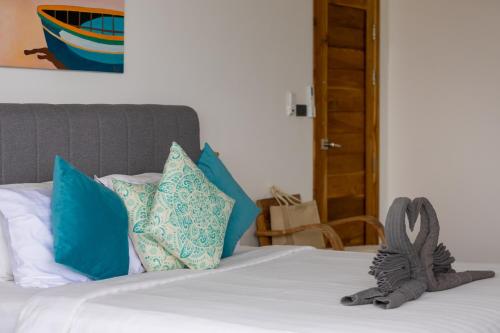 Letto o letti in una camera di VILLA CLARISSE - SEAVIEW - 4 Bedrooms