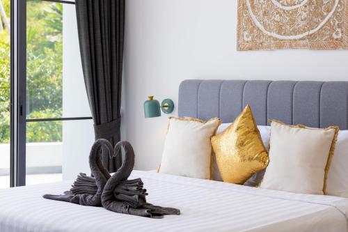 Letto o letti in una camera di VILLA CLARISSE - SEAVIEW - 4 Bedrooms