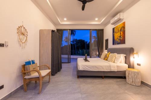 Letto o letti in una camera di VILLA CLARISSE - SEAVIEW - 4 Bedrooms
