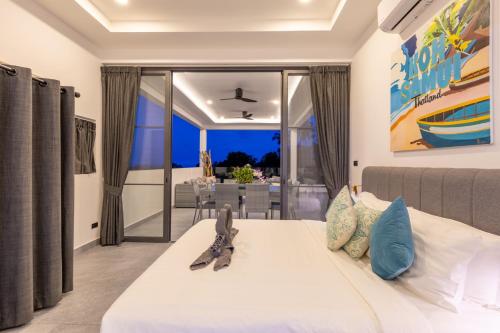 Letto o letti in una camera di VILLA CLARISSE - SEAVIEW - 4 Bedrooms