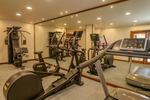 a gym with several tread machines and a treadmill at JAZ Dahabeya in Dahab
