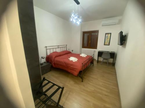 Postel nebo postele na pokoji v ubytování Le Ninfe Guest House