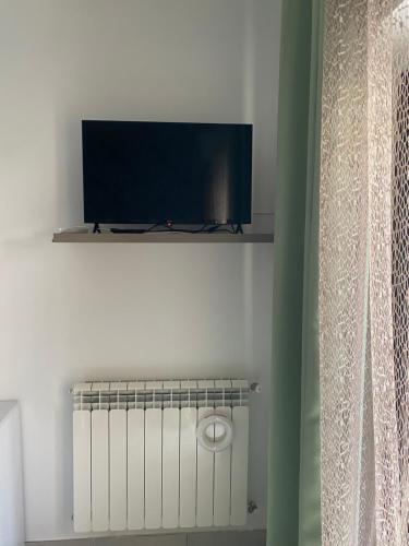Televisyen dan/atau pusat hiburan di Xenia Rooms