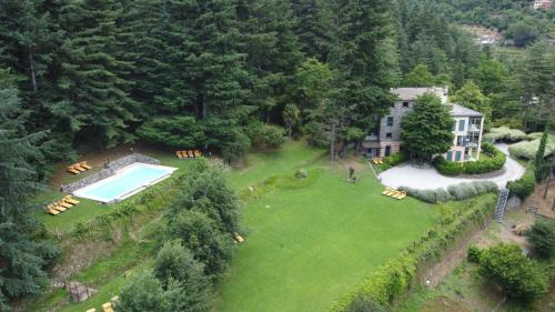 Κήπος έξω από το Il Bosco di Campo Marzano Nature Retreats