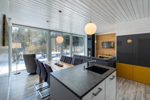 Posezení v ubytování 4 Personen mit Sauna F0H1