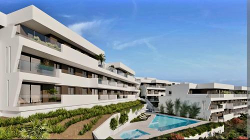 an architectural rendering of a building with a swimming pool at J&J Luxury Apartments in Estepona