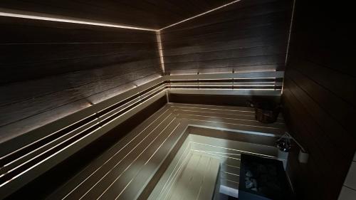 an empty wooden room with a wooden floor and a wooden floor at CHATA Privlaky in Přívlaky