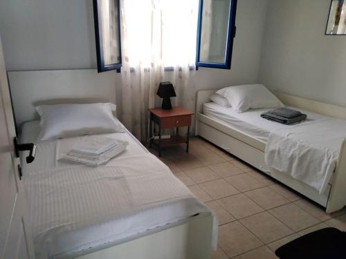 Katil atau katil-katil dalam bilik di Sea view villa